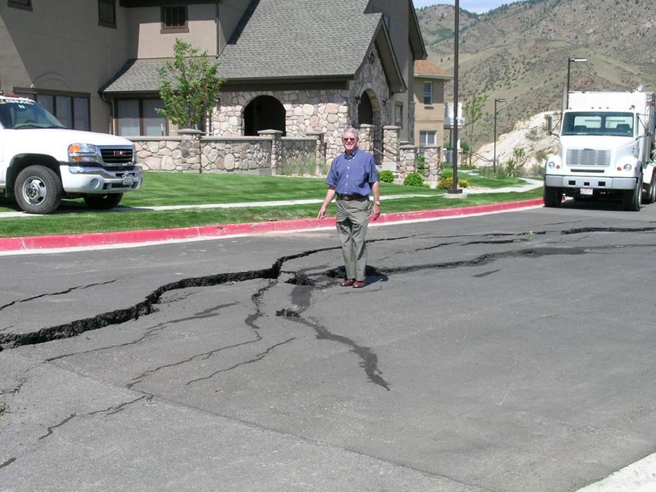 Man Standing in a Sink Hole